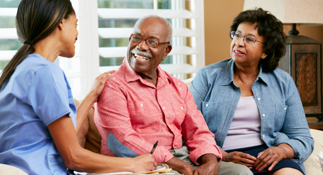 Doctor visiting patient at home